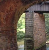 Railway bridge arches over the Derwent at Ambergate